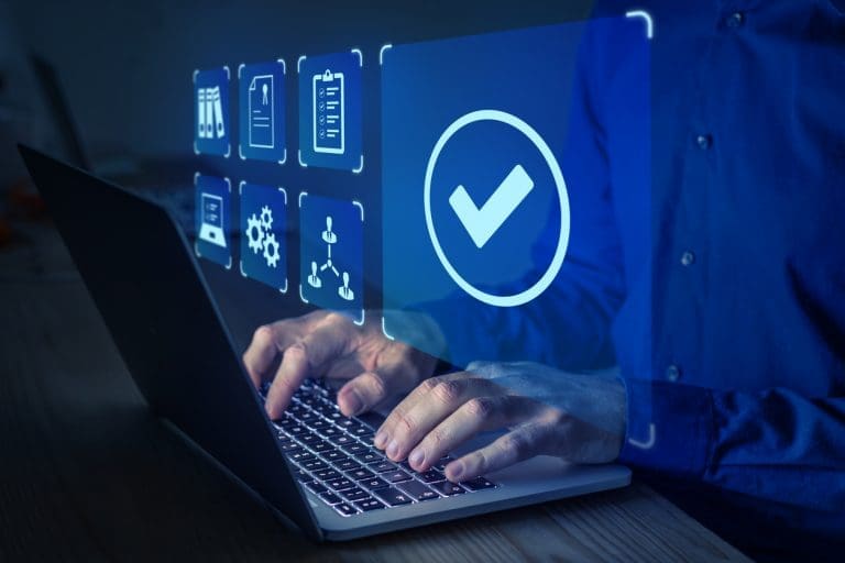 Check box above a laptop for different qualifications